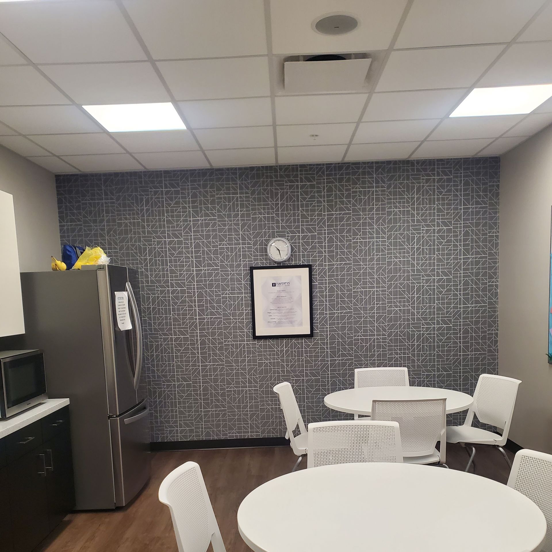 Completed interior remodel with acoustic ceiling grid.