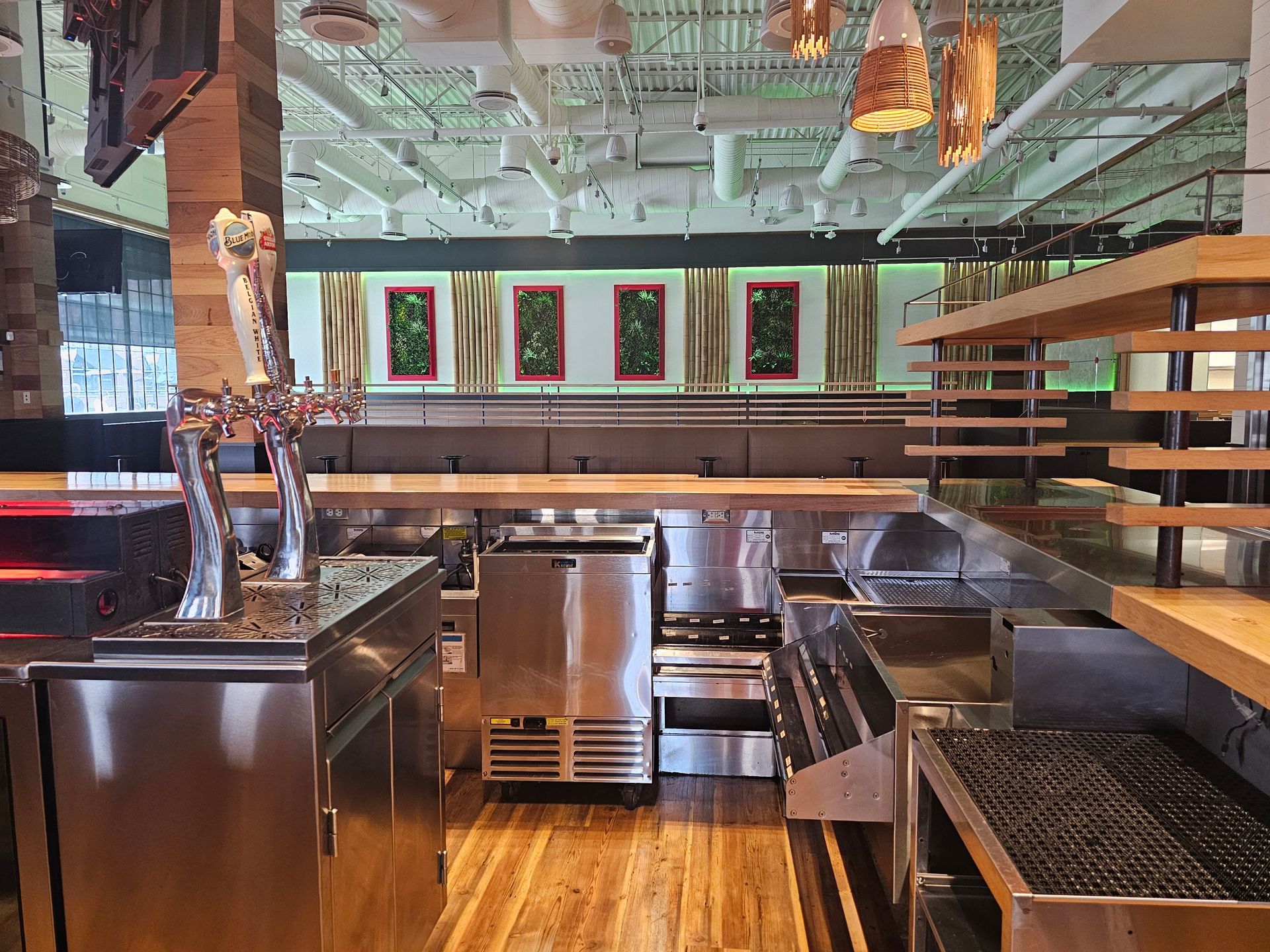 Commercial kitchen buildout with finished ceiling.