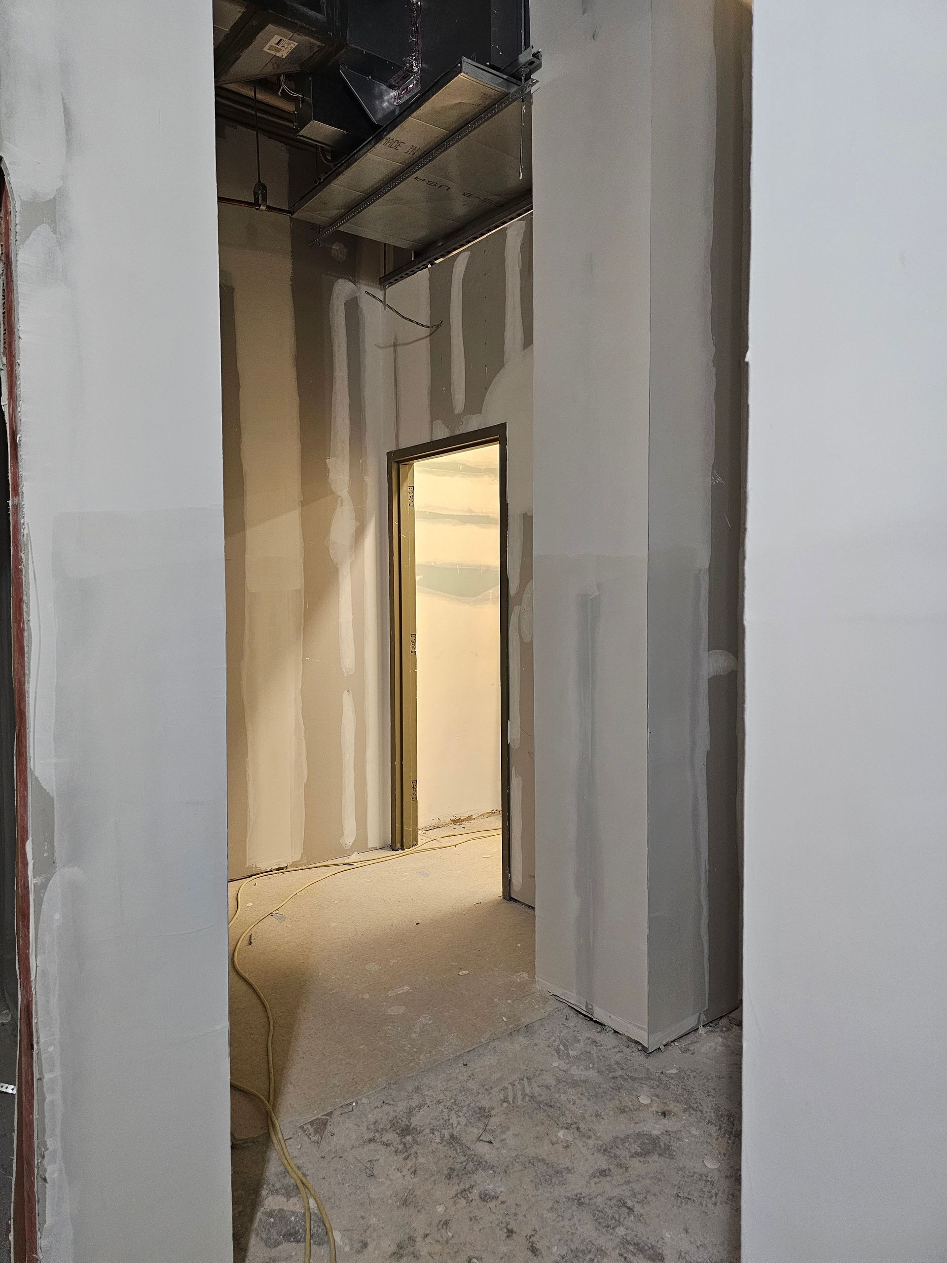 Framed and boarded interior partition wall.